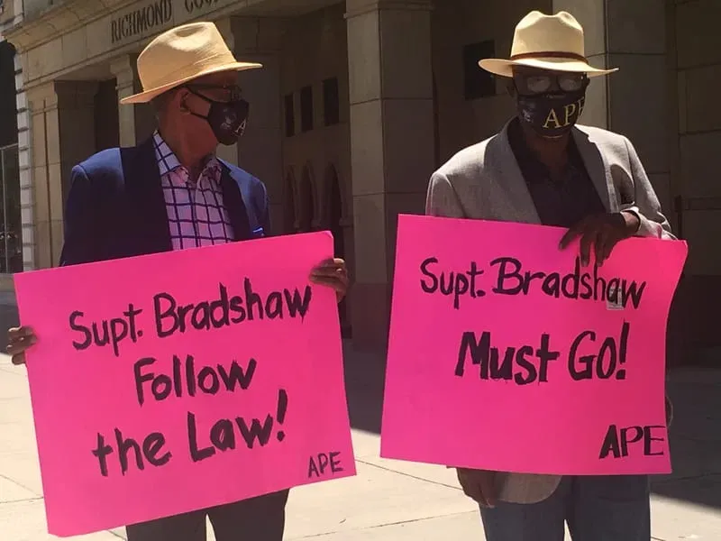 A.P.E. advocates making a public stand outside a courthouse